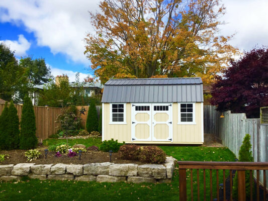 Lofted Barn 10x16, 2x3 windows, Double Barn Doors with windows, Eaglet Beige, and Burnished Metal Roof.